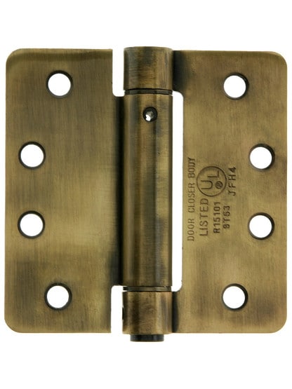 4 inch Spring Hinge With 1/4 inch Radius Corners Antique Brass.